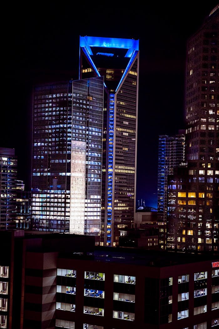 Modern Glass Building at Night 